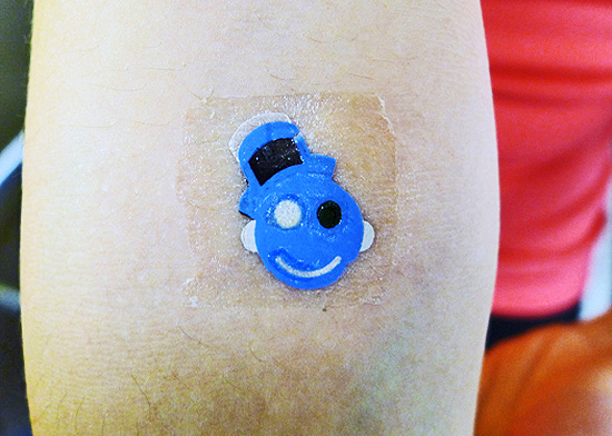 Татуировка-сенсор в виде смайлика контролирует метаболизм